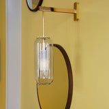 modern-vadim-glass-wall-sconce-with-perforated-metal-cage-and-brass-finish-for-luxury-interiors