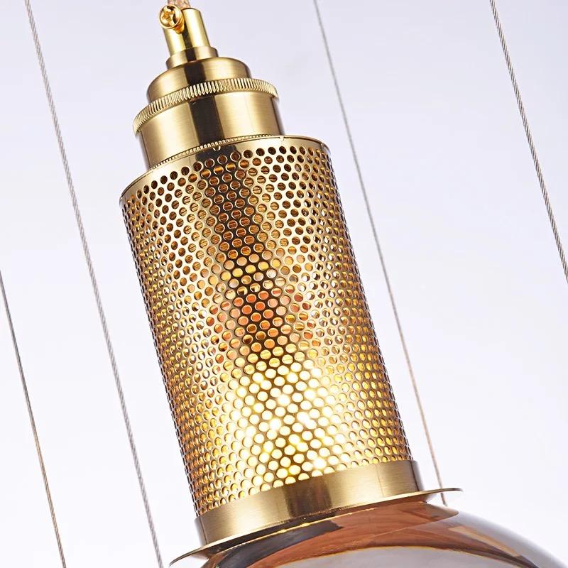 modern-glass-crystal-pendant-light-gold-chandelier-with-cylindrical-reflector-and-spherical-element-design