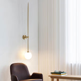 modern-brass-and-opal-glass-sphere-mobile-wall-sconce-lighting-for-indoor-spaces