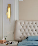 modern-brutalist-gold-metal-sculpted-wall-sconce-integrated-led-vertical-light-fixture