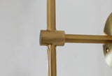 modern-brass-and-opal-glass-sphere-mobile-wall-sconce-lighting-for-indoor-spaces