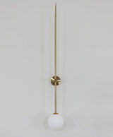 modern-brass-and-opal-glass-sphere-mobile-wall-sconce-lighting-for-indoor-spaces