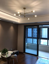 modern-brass-mobile-chandelier-with-adjustable-arms-mid-century-pendant-lighting