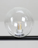 modern-linear-chandelier-with-clear-glass-globe-shades-for-geometric-dining-room-lighting