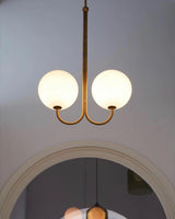 mid-century-modern-triple-angle-brass-pendant-lamp-with-opal-glass-globe-shade