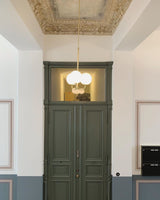 mid-century-modern-triple-angle-brass-pendant-lamp-with-opal-glass-globe-shade