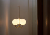 mid-century-modern-triple-angle-brass-pendant-lamp-with-opal-glass-globe-shade
