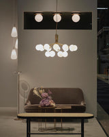 modern-apiales-glass-globe-chandelier-flower-inspired-pendant-light-for-dining-room