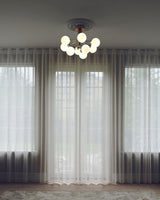 modern-apiales-glass-globe-chandelier-flower-inspired-pendant-light-for-dining-room