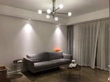 modern-hand-blown-glass-globe-chandelier-with-elegant-brass-and-copper-finishes
