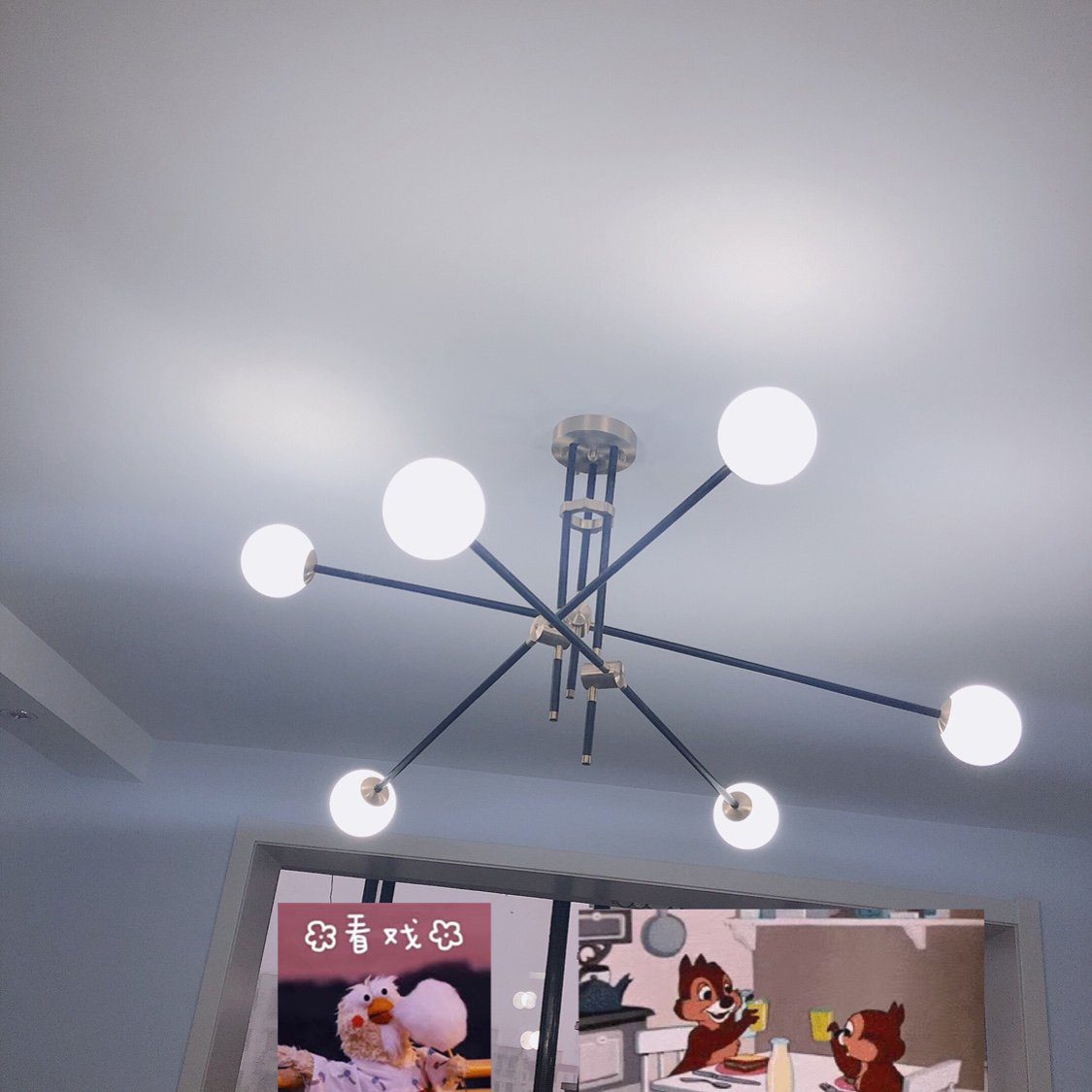 modern-hand-blown-glass-globe-chandelier-with-elegant-brass-and-copper-finishes
