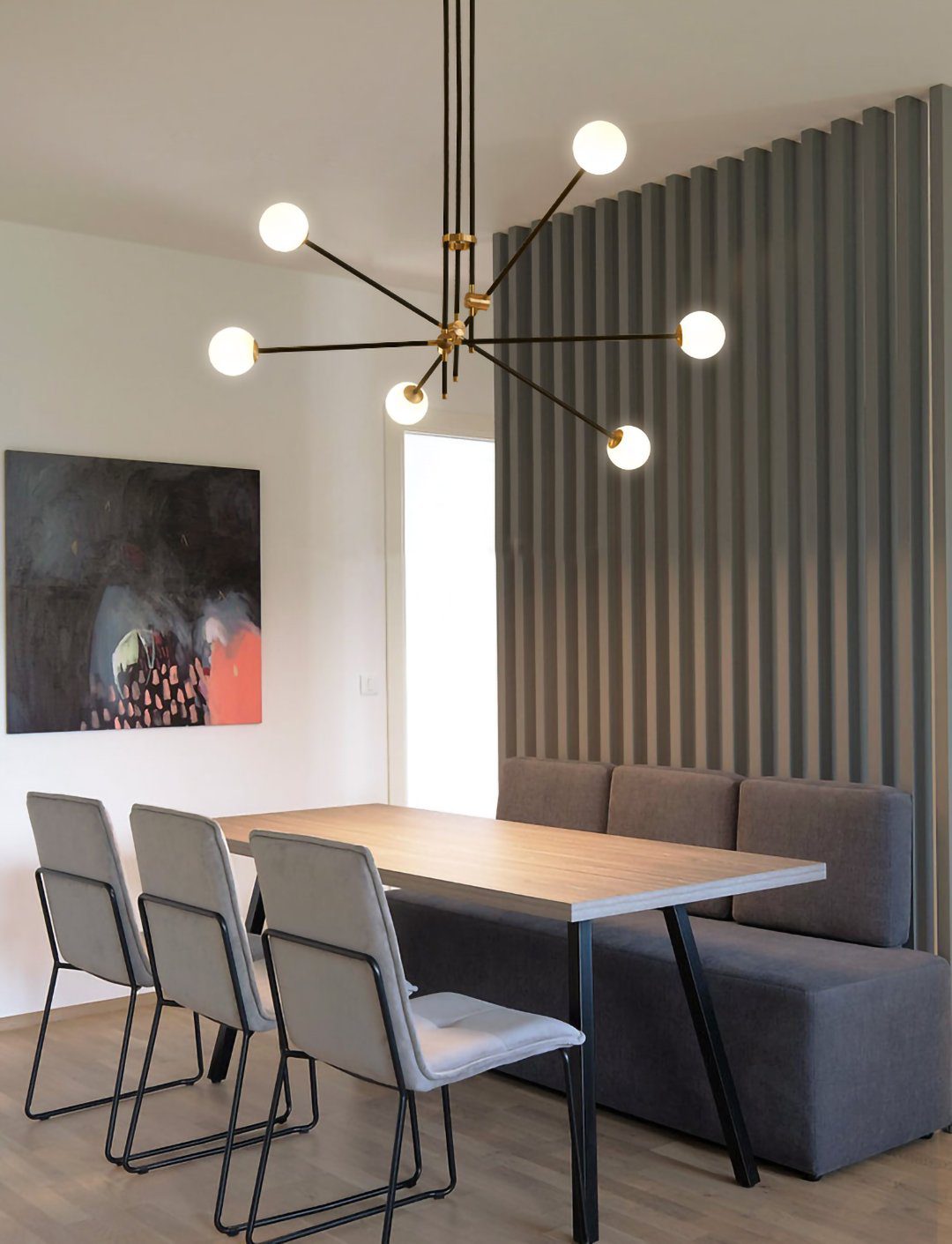 modern-hand-blown-glass-globe-chandelier-with-elegant-brass-and-copper-finishes