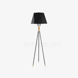 modern-solitaire-tripod-floor-lamp-with-black-polygonal-cloth-shade-and-brass-accents