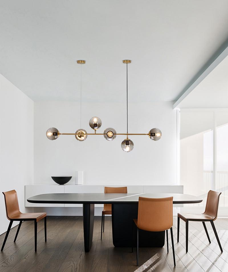contemporary-multi-glass-globe-pendant-light-with-round-orb-shades-and-polished-brass-frame