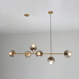 contemporary-multi-glass-globe-pendant-light-with-round-orb-shades-and-polished-brass-frame