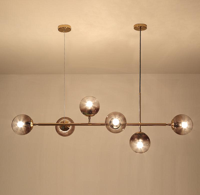 contemporary-multi-glass-globe-pendant-light-with-round-orb-shades-and-polished-brass-frame
