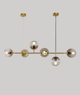 contemporary-multi-glass-globe-pendant-light-with-round-orb-shades-and-polished-brass-frame