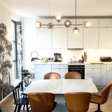 contemporary-multi-glass-globe-pendant-light-with-round-orb-shades-and-polished-brass-frame