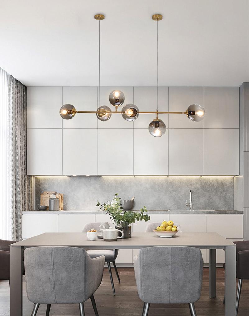 contemporary-multi-glass-globe-pendant-light-with-round-orb-shades-and-polished-brass-frame