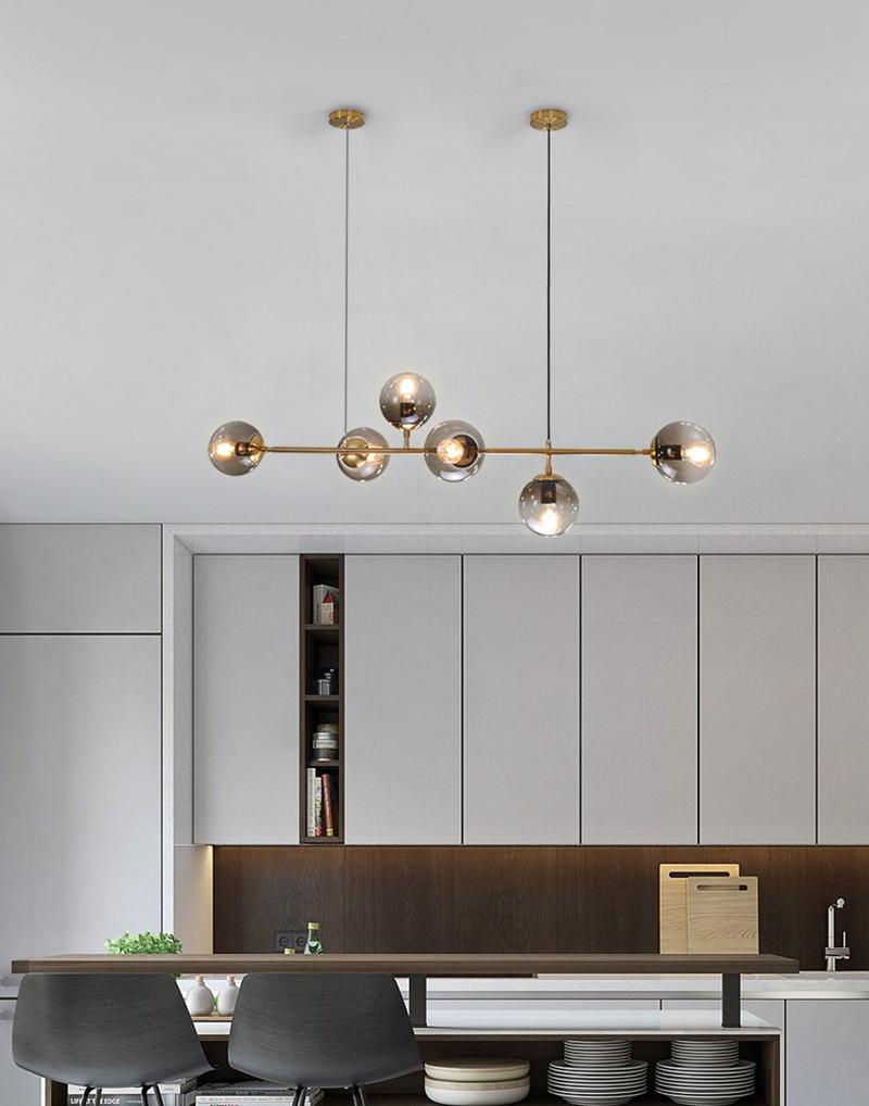 contemporary-multi-glass-globe-pendant-light-with-round-orb-shades-and-polished-brass-frame