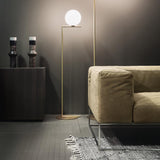 modern-industrial-gold-standing-lamp-with-white-glass-globe-shade-and-foot-switch
