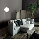 modern-industrial-gold-standing-lamp-with-white-glass-globe-shade-and-foot-switch
