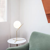 modern-opalescent-blown-glass-globe-table-lamp-with-flexible-steel-base-and-gold-finish