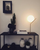 modern-opalescent-blown-glass-globe-table-lamp-with-flexible-steel-base-and-gold-finish