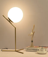 modern-opalescent-blown-glass-globe-table-lamp-with-flexible-steel-base-and-gold-finish