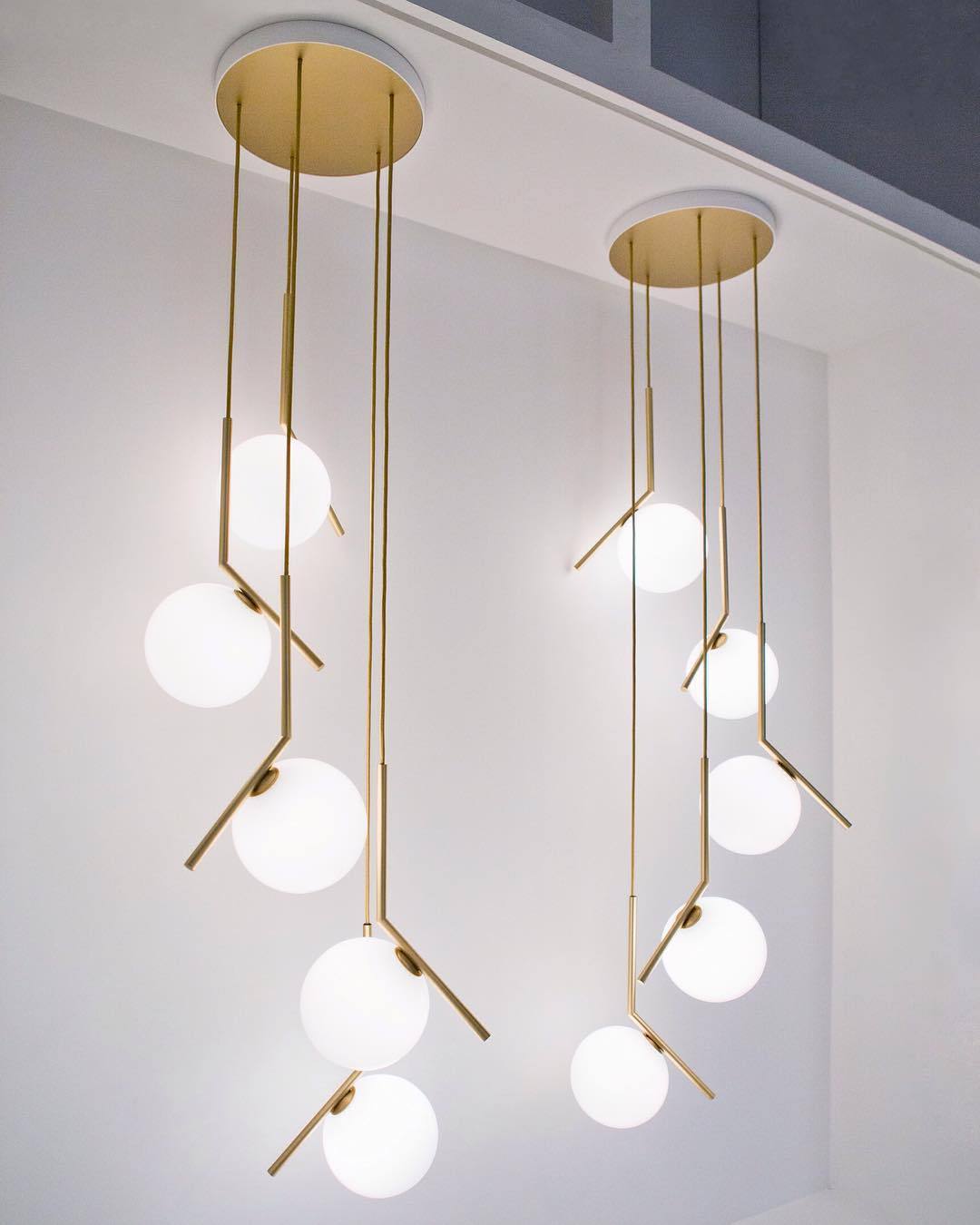 modern-brass-and-opal-glass-globe-pendant-light-minimalist-baton-design-hanging-lamp