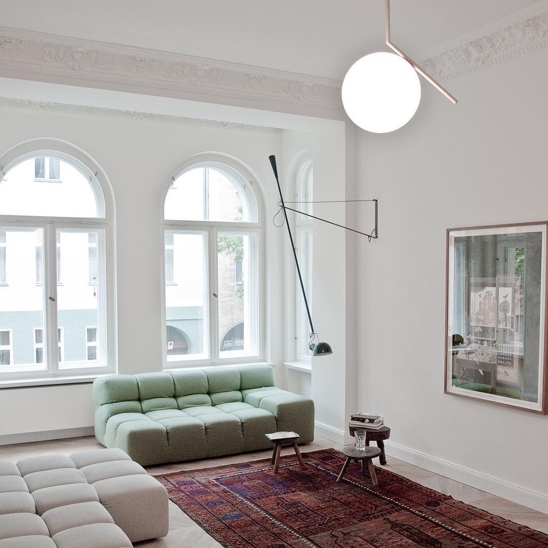 modern-brass-and-opal-glass-globe-pendant-light-minimalist-baton-design-hanging-lamp