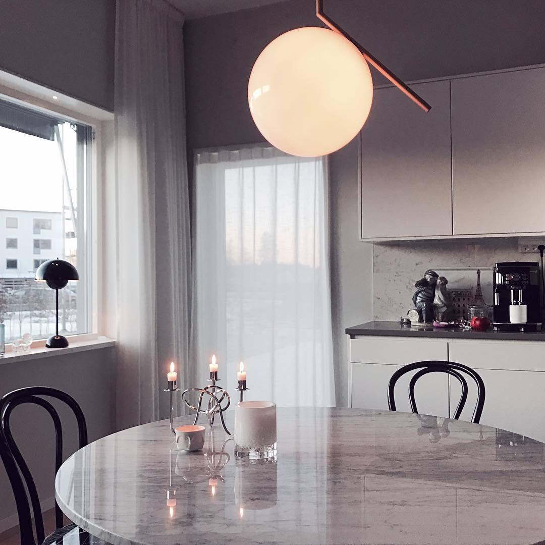 modern-brass-and-opal-glass-globe-pendant-light-minimalist-baton-design-hanging-lamp