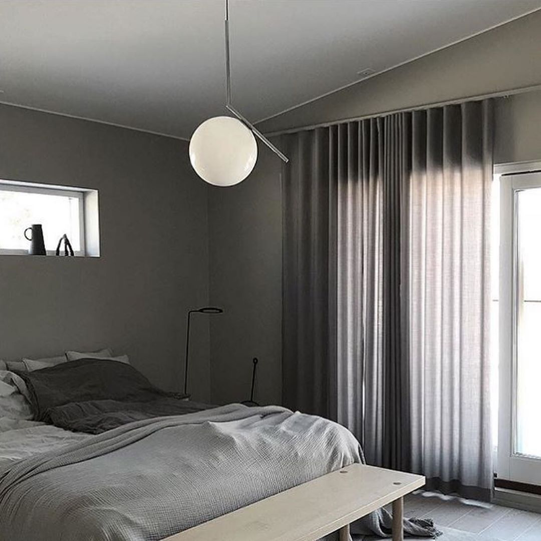 modern-brass-and-opal-glass-globe-pendant-light-minimalist-baton-design-hanging-lamp