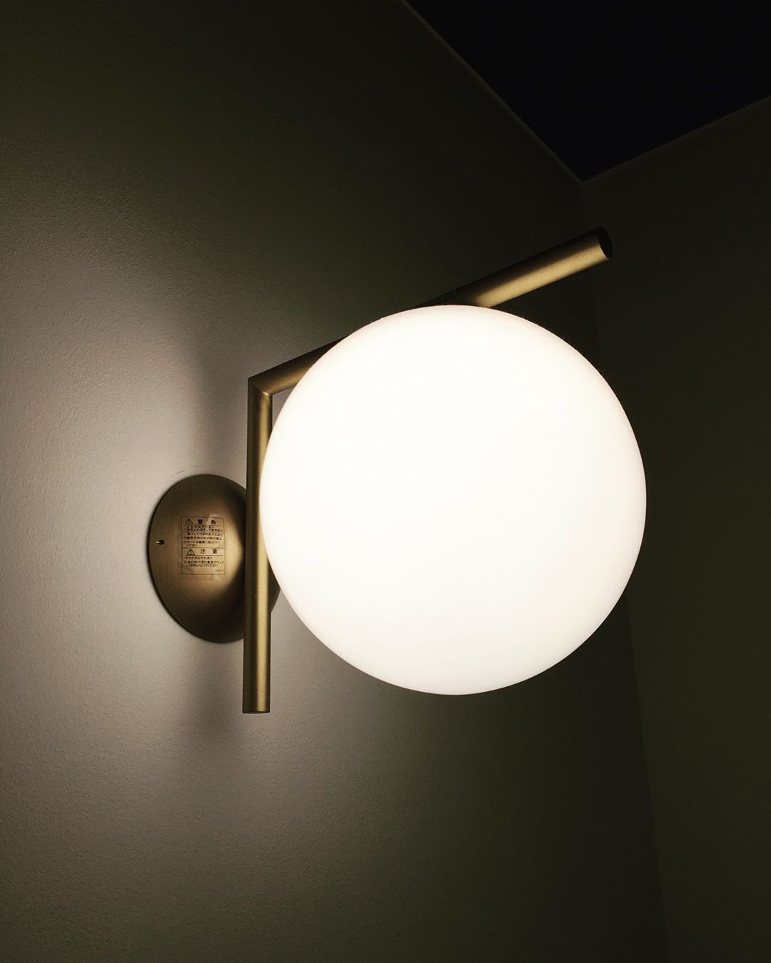 modern-opal-blown-glass-wall-sconce-with-elegant-brass-finish-round-globe-lighting