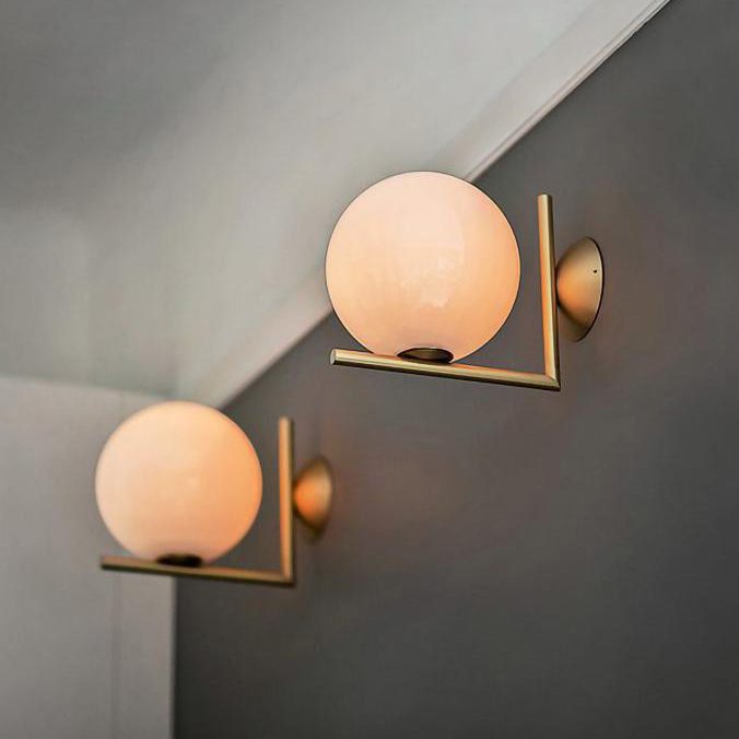 modern-opal-blown-glass-wall-sconce-with-elegant-brass-finish-round-globe-lighting