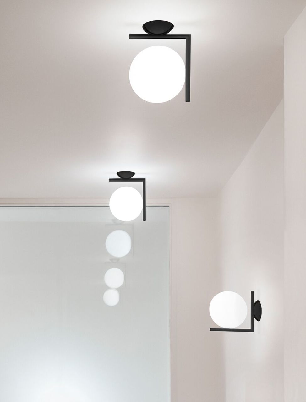 modern-opal-blown-glass-wall-sconce-with-elegant-brass-finish-round-globe-lighting