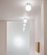 modern-opal-blown-glass-wall-sconce-with-elegant-brass-finish-round-globe-lighting