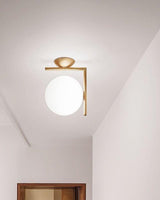 modern-opal-blown-glass-wall-sconce-with-elegant-brass-finish-round-globe-lighting