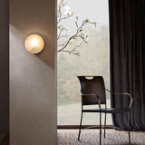 modern-natural-alabaster-stone-and-solid-brass-round-wall-sconce-luxury-lighting-fixture