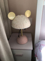 modern-terrazzo-base-table-lamp-with-green-fabric-shade-and-elegant-brass-accents