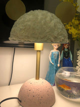 modern-terrazzo-base-table-lamp-with-green-fabric-shade-and-elegant-brass-accents