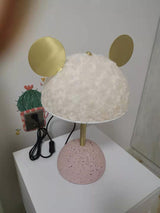 modern-terrazzo-base-table-lamp-with-green-fabric-shade-and-elegant-brass-accents