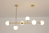 contemporary-multi-glass-globe-pendant-light-with-round-orb-shades-and-polished-brass-frame