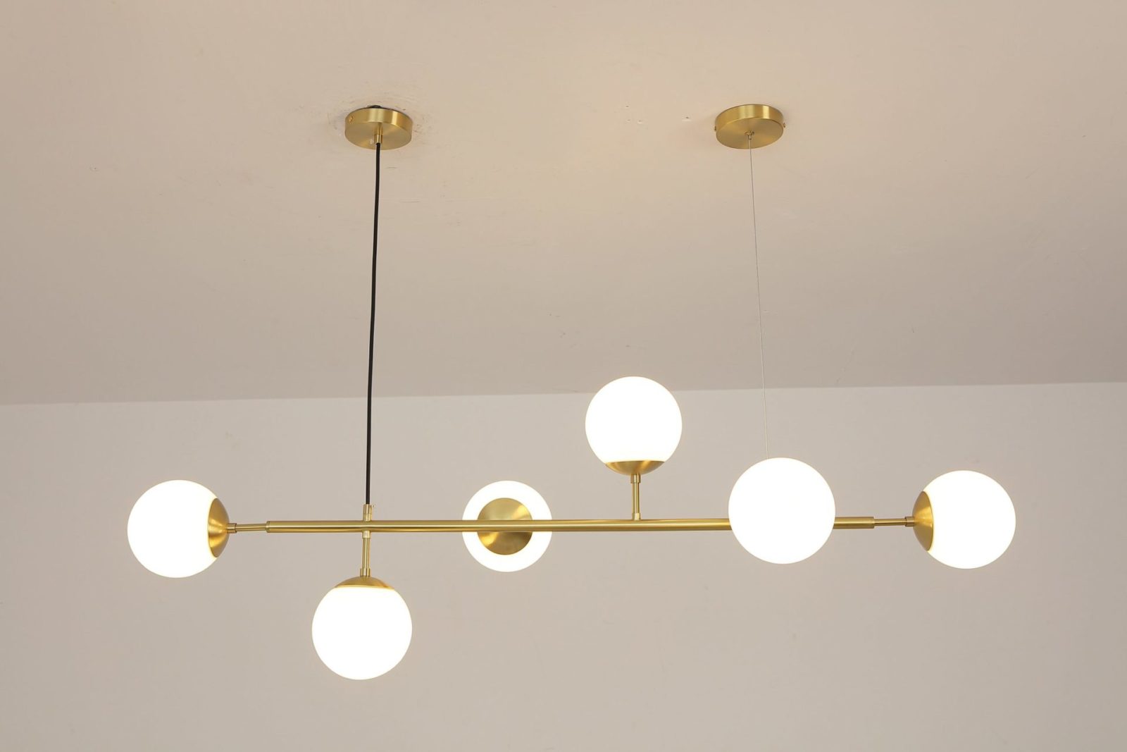 contemporary-multi-glass-globe-pendant-light-with-round-orb-shades-and-polished-brass-frame