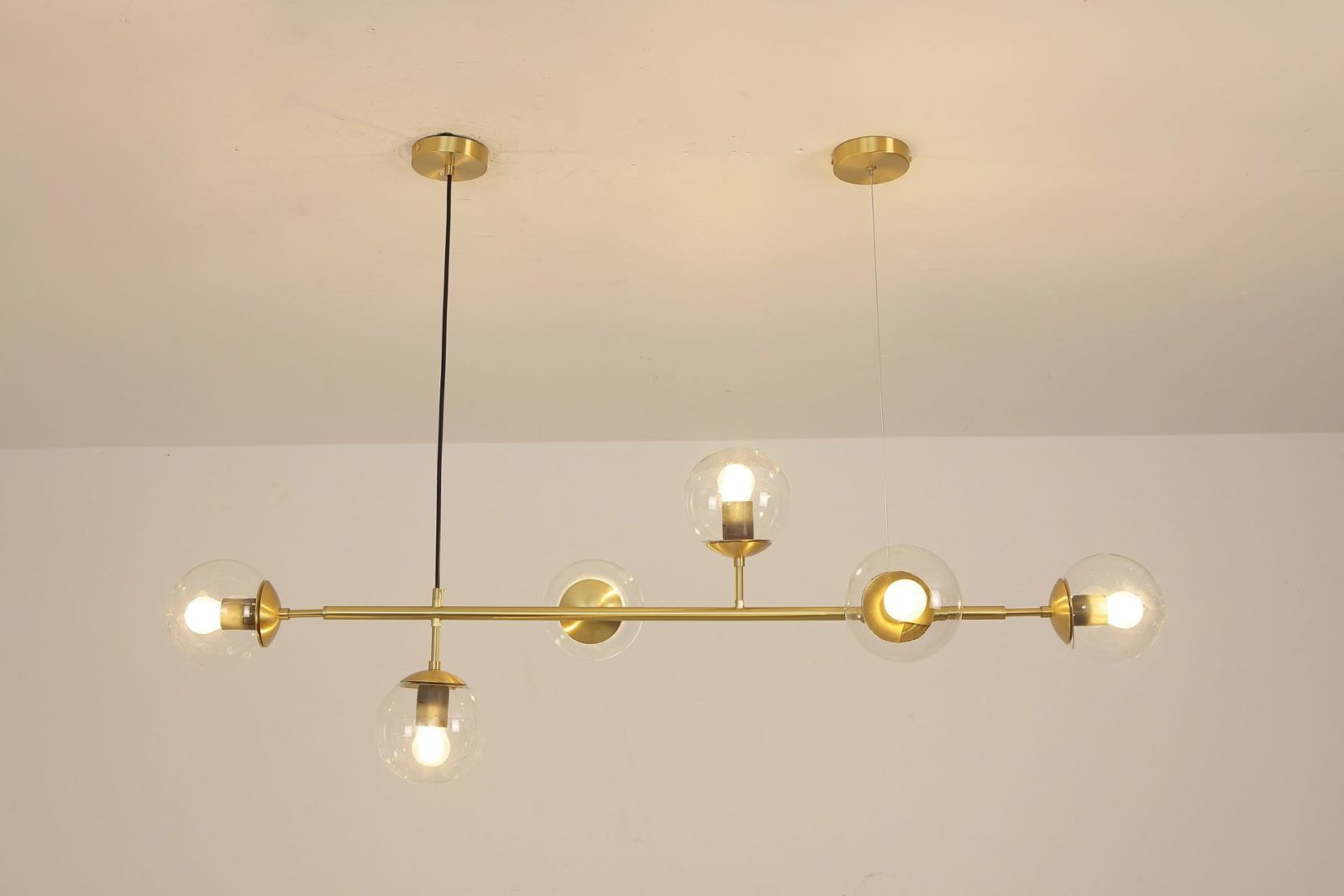 contemporary-multi-glass-globe-pendant-light-with-round-orb-shades-and-polished-brass-frame