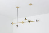 contemporary-multi-glass-globe-pendant-light-with-round-orb-shades-and-polished-brass-frame