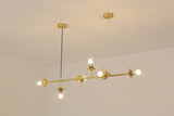 contemporary-multi-glass-globe-pendant-light-with-round-orb-shades-and-polished-brass-frame