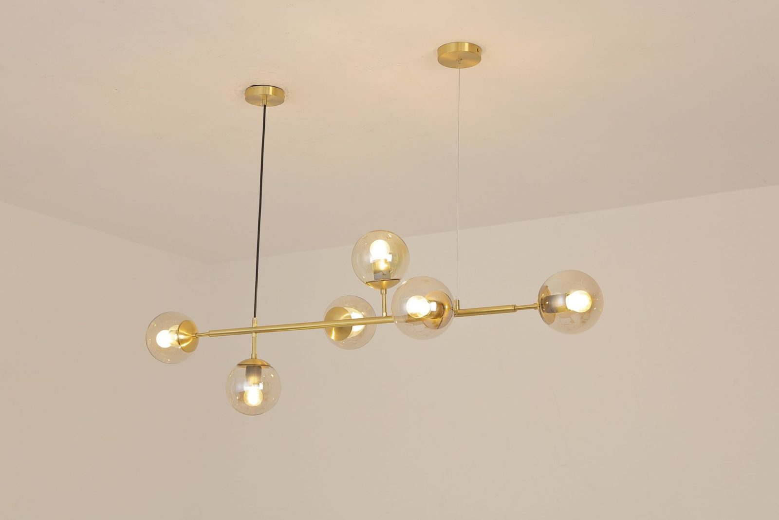 contemporary-multi-glass-globe-pendant-light-with-round-orb-shades-and-polished-brass-frame
