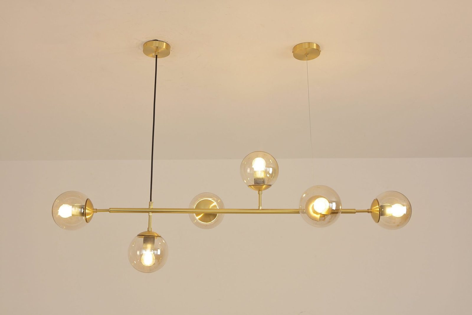 contemporary-multi-glass-globe-pendant-light-with-round-orb-shades-and-polished-brass-frame