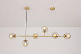 contemporary-multi-glass-globe-pendant-light-with-round-orb-shades-and-polished-brass-frame